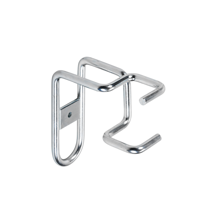 Hållare för fotlist som förhindrar nedfallande material.